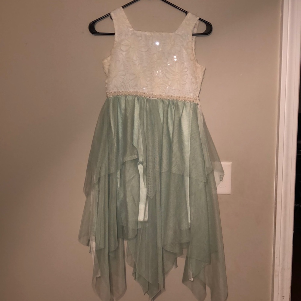 A pretty white and teal dress for kids ages 10-15.